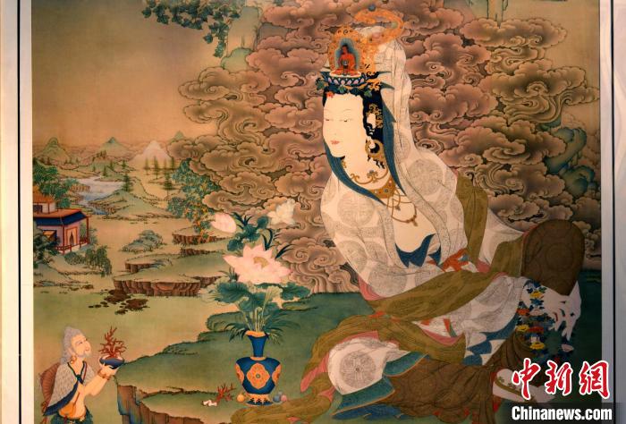 圖為(wei) 5月16日，展覽中新創唐卡作品《靜息觀音》(局部)。　李林 攝